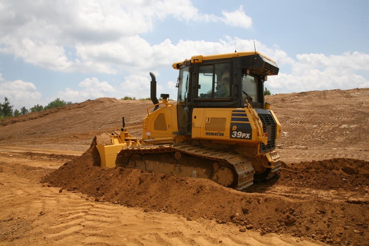 A dozer can load its blade to maximum because it senses track slip