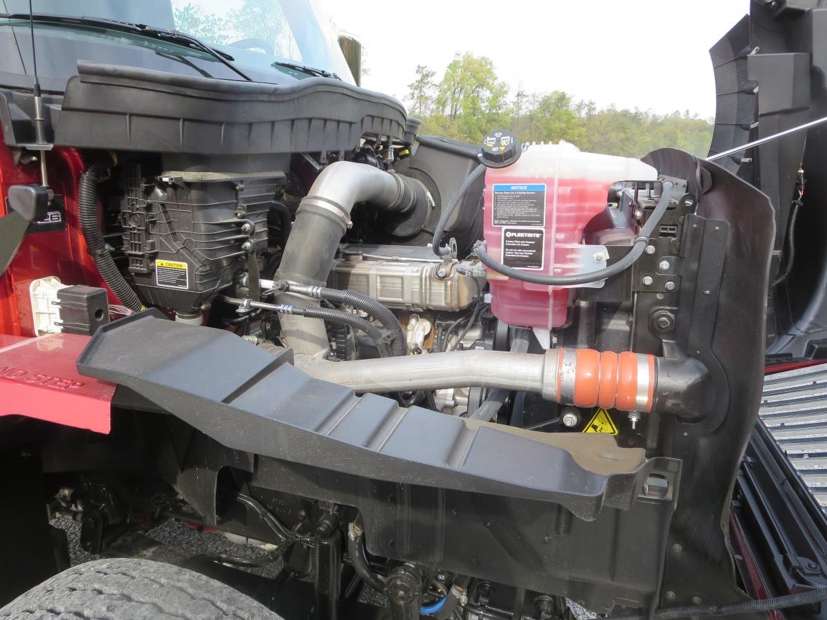 Navistar’s 12.4-liter A26 nestles in the big engine compartment