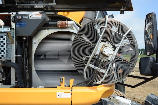 Reversible fan that swings out for cooler cleaning